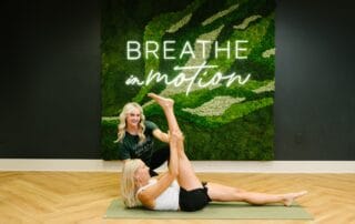 physical therapist teaching pilates